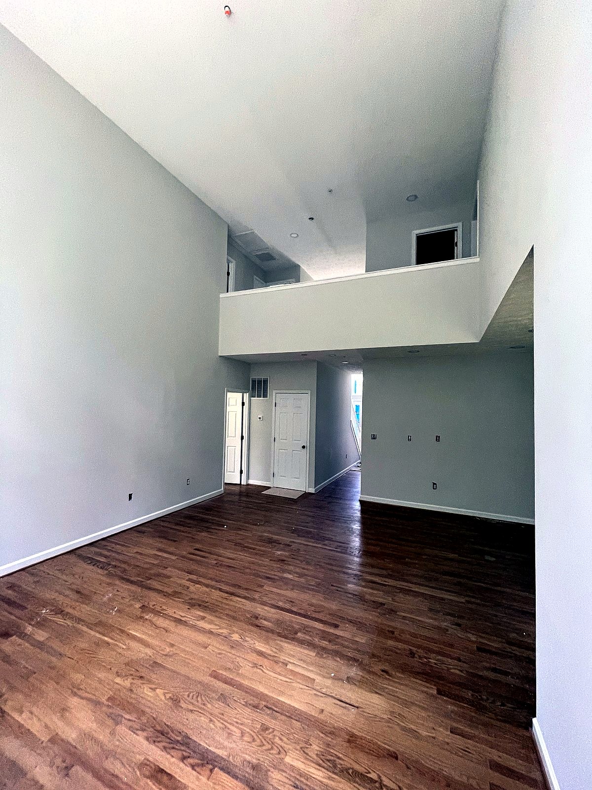 Two-story family room renovation with upstairs overlook